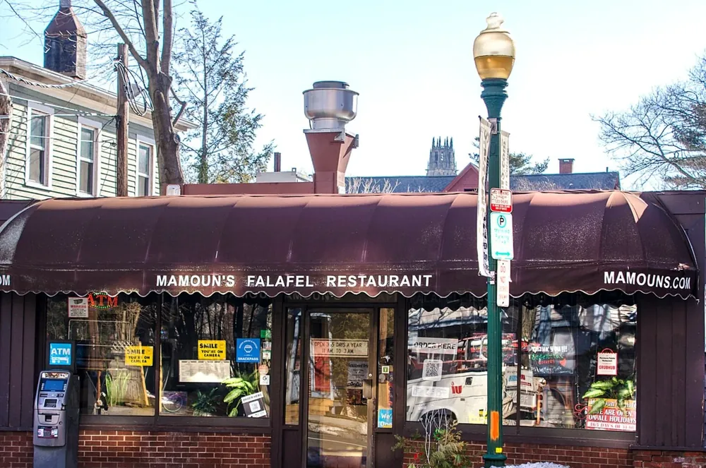 Mamoun's Falafel Restaurant beneath its deep red awning