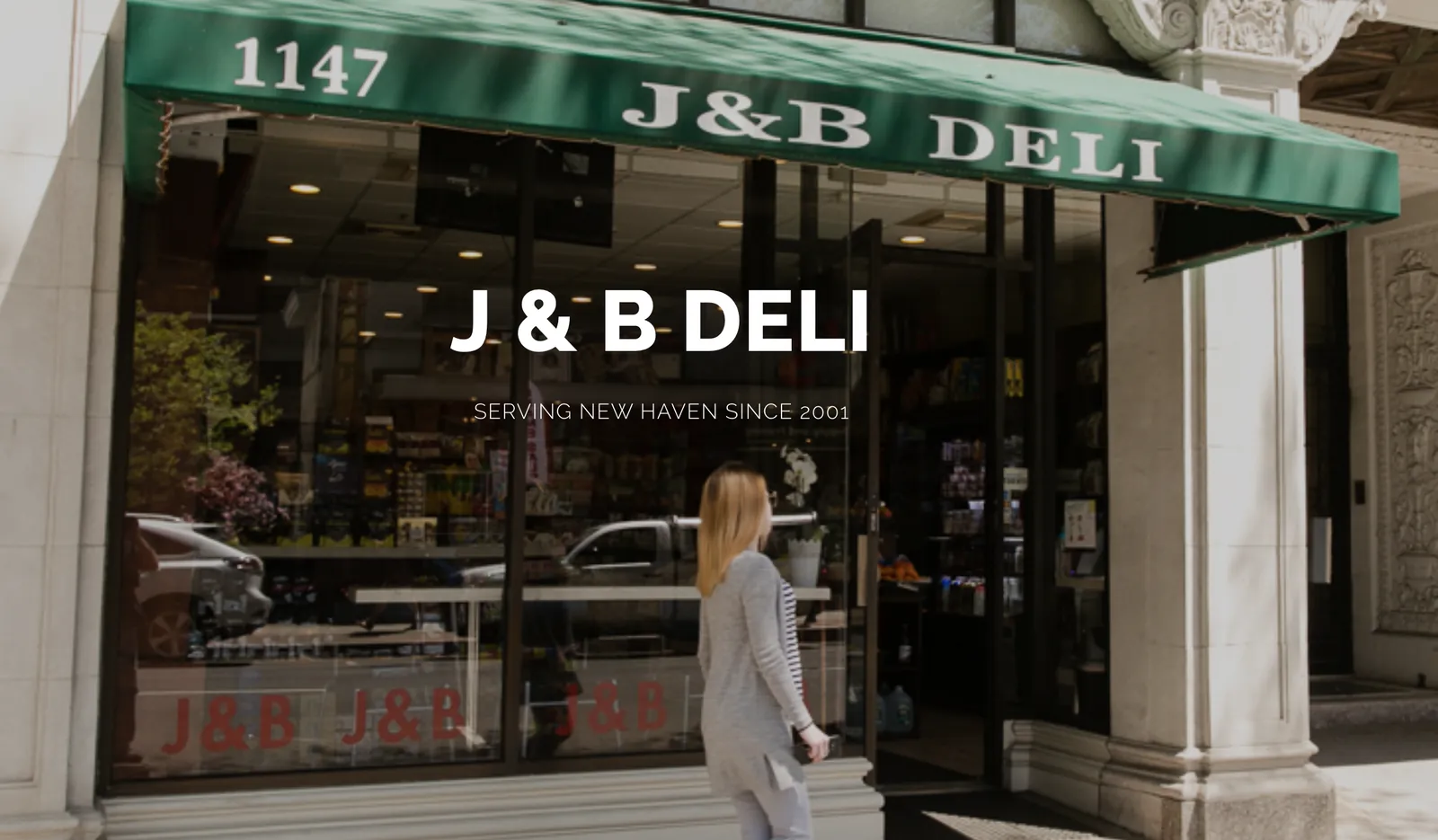 J&B Deli's green awning and windows at 1147, with the deli's name set across the picture