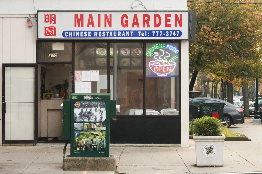 Main Garden Chinese Restaurant's red storefront sign above its windows