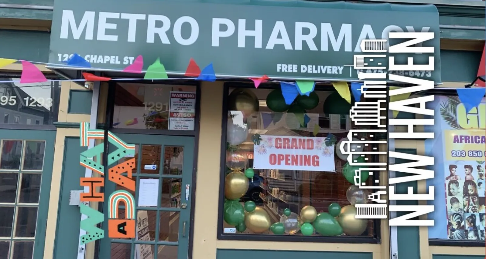 The Metro Pharmacy storefront at 1295 Chapel Street on its opening day, hung with bunting and green and gold balloons, with a Grand Opening banner in the window.